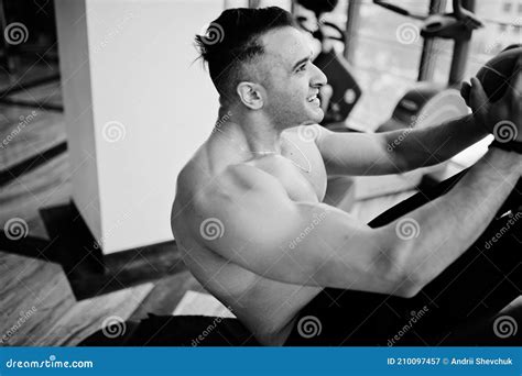Muscular Arab Man Training In Modern Gym Fitness Arabian Men With Naked Torso Doing Exercises