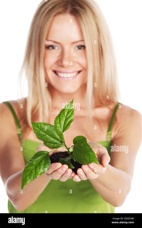 Plant In Blonde Hands Close Up Stock Photo Alamy