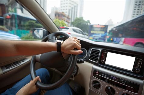 Premium Photo People Hands Holding Steering Wheel While Driving Car