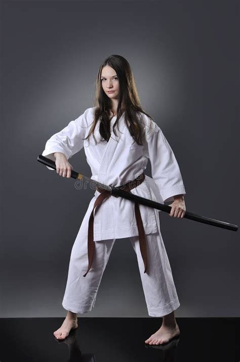 Beautiful Young Brown Belt Female Karate Doing Kick Stock Image - Image ...