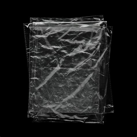 A Clear Plastic Bag On A Black Background