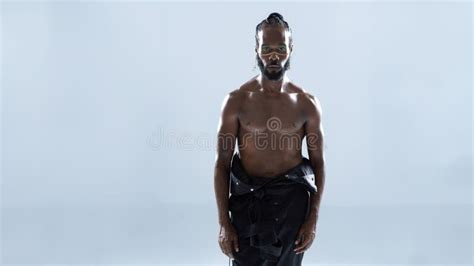 Shirtless African American Gay Man With Bright Makeup Looking At Camera Stock Photo Image Of