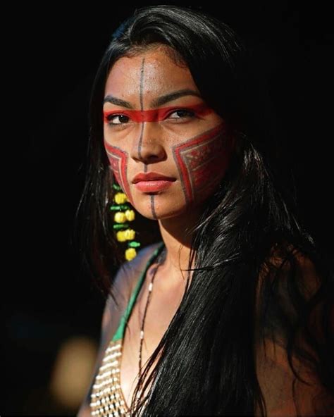 A Native American Woman With Painted On Her Face