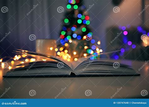 Open Book And Blurred Christmas Tree Stock Photo Image Of Evening