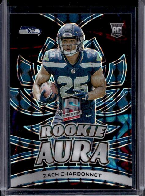 2023 Panini Spectra Zach Charbonnet Interstellar Prizm Rookie Aura RC