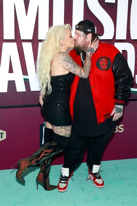 Jelly Roll His Wife Bunnie Xo Are All Smiles Arriving To Cmt