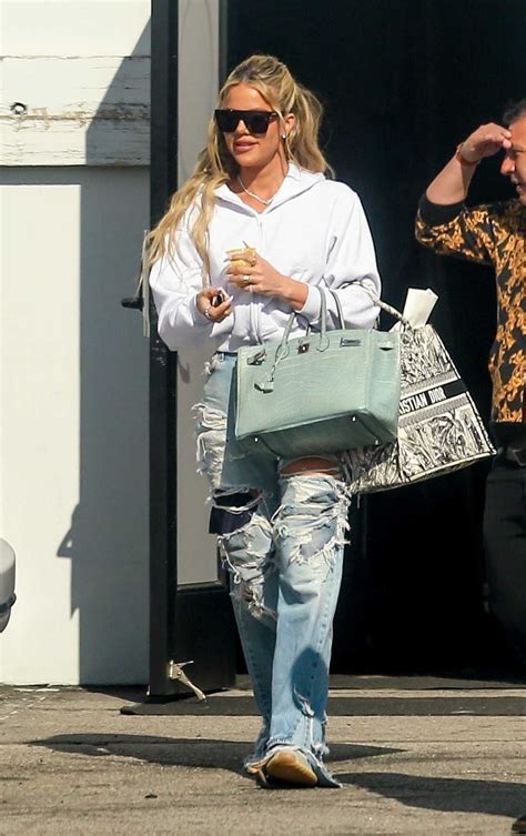 Khloe Kardashian In A Blue Ripped Jeans Leaves A Studio In Calabasas