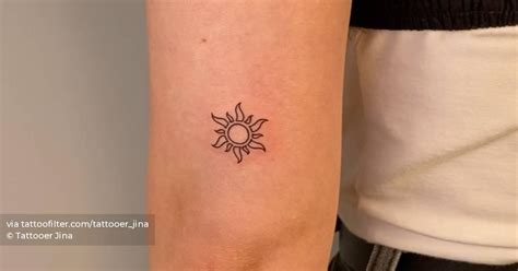 Minimalist Sun Tattoo On The Tricep