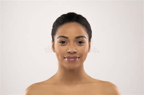 Half Face Of Beautiful Smiling African Woman Posing Naked Stock Photo