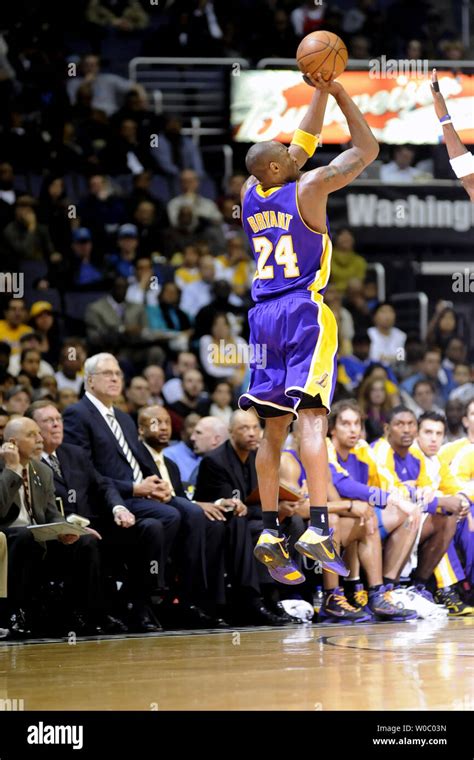 Los Angeles Lakers Guard Kobe Bryant 24 Makes A 3 Point Shot In The 1st Quarter Against The