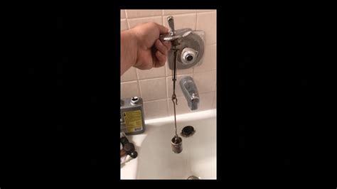 How To Fix A Stuck Drain Stopper In The Bath Tub Youtube