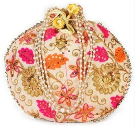 Wedding Wear Cream Potli Bags Manufacturer At Piece In New Delhi