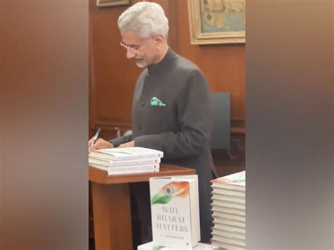eam  jaishankar signs copies    book  bharat matters