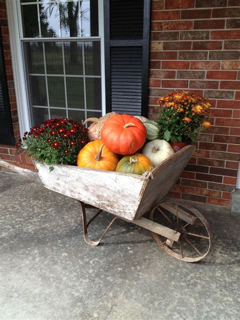 Front Porch Decoration Antique Wooden Wheelbarrow With Pumpkins And