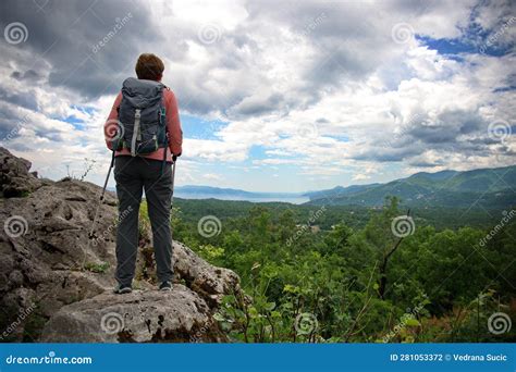 Woman Standing At The Edge Of A Cliff Stock Photo Image Of Formation