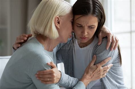 Caring Mature Mother Comforting Hugging Upset Adult Daughter Close Up Stock Photo Image Of