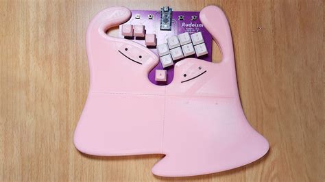 A custom-made fighting game pad but it's two ditto
