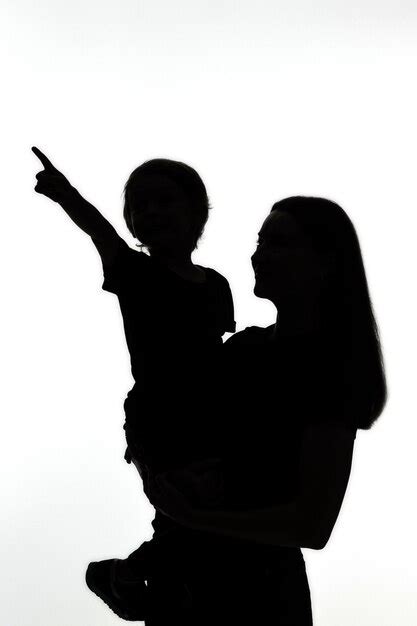 Mother And Child Praying Silhouette