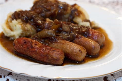 Sausages With Mashed Potatoes Beer And Onion Gravy And Mustard Recipe