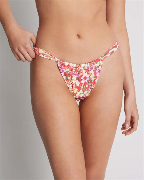 Shop Rhythm Bloom Floral Soft Side Itsy Bikini Bottom In Red Fast