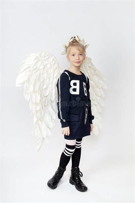 Pretty Young Lady with Angel Wings Stock Photo - Image of beautiful, minor: 243198652