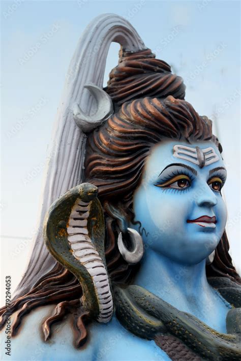 Statue Of Hindu God Shiva With Serpent Around The Neck And Ganga River