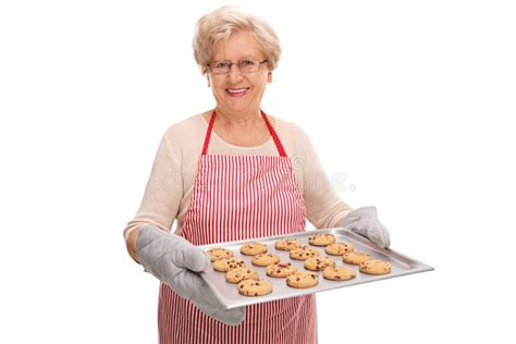 Mature Lady Holding A Tray With Cookies Stock Photo Image Of Glad