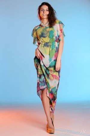 Blue Eyed Brunette Takes Off Her Long Colorful Dress And XXX Dessert