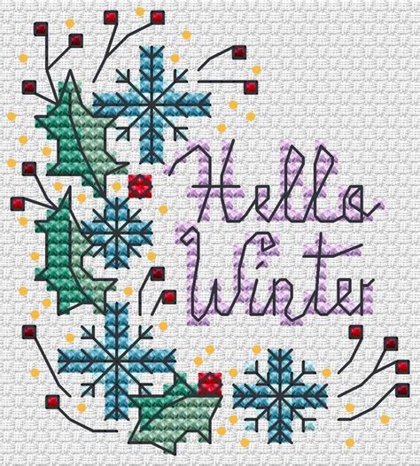 A Cross Stitch Pattern With The Words Hello Winter Written In Purple