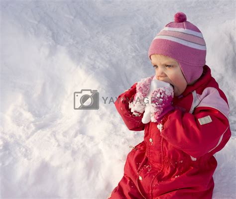 Royalty Free Image | Child eating snow by kavring