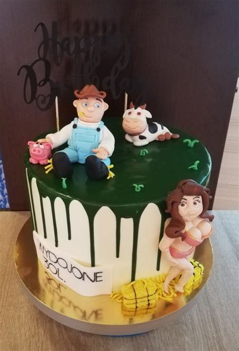 There Is A Cake That Has Been Decorated With Cartoon Characters On The