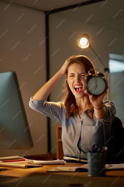 Premium Photo | Woman stress and overtime with clock in office portrait