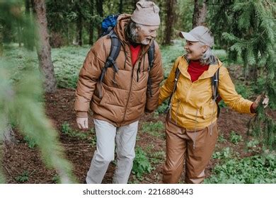 Mature Woman Man Walking Together Forest Stock Photo 2216880443 Shutterstock
