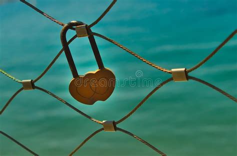 Yellow Love Lock on Bridge Railing Stock Image - Image of bridge, front ...