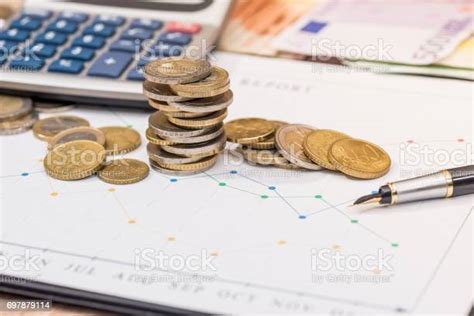 business graph  euro coin banknote  calculator stock photo