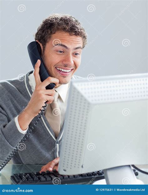 Charming Businessman On Phone At His Desk Stock Image Image Of Busy