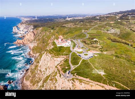 Aerial view of Cabo da Roca lighthouse with majestic coastline looking