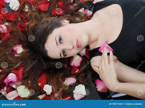 Beautiful Brunette In Rose Petals Stock Photo Image Of Model Girl