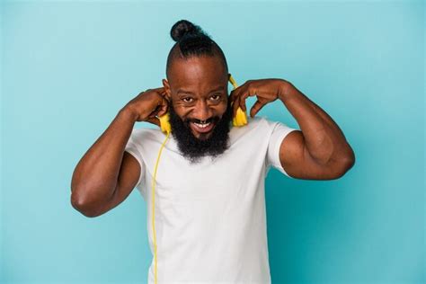 Premium Photo African American Man Listening To Music Isolated On