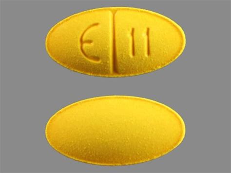 Yellow Oval Pill With V