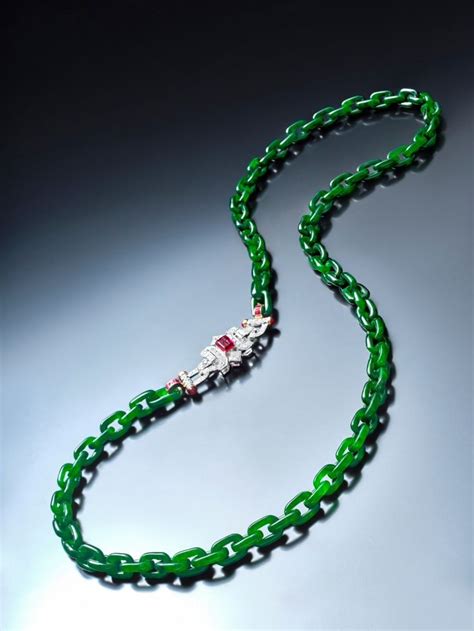 Rare And Carved Jadeite Interlocked Links With Diamond And Ruby