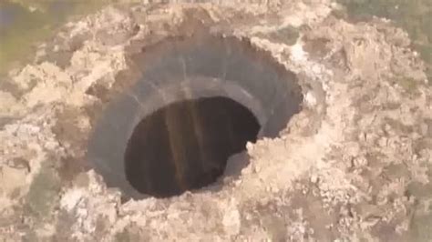 Mysterious Giant Hole Opens Up in Siberia, Russia | The Weather Channel