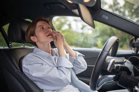 Woman Drives Car With Broken Air Conditioning In Hot Summer Weather Wipes Sweat Paper Napkin