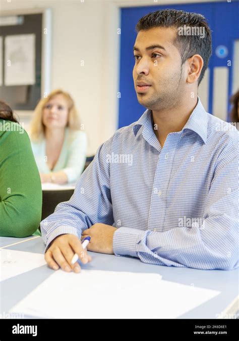 Adult Education Attentive Learner A Mature Student Listening To His