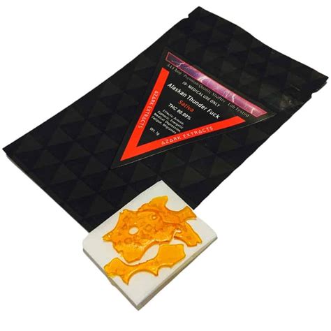 Azark Extracts Alaskan Thunder Fuck Sativa Shatter Goldbuds