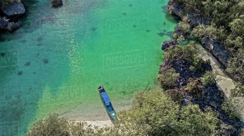 Aerial View Of Boat Moored On Beach By Mangroves Baer Island Kei