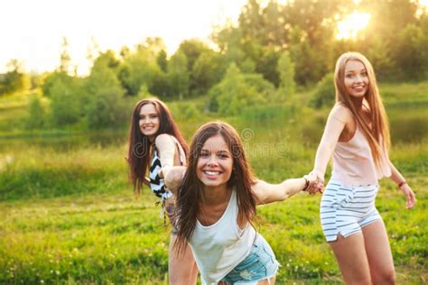 Girlfriends Friendship Happiness Community Concept Three Smiling Friends Hugging Outdoors In