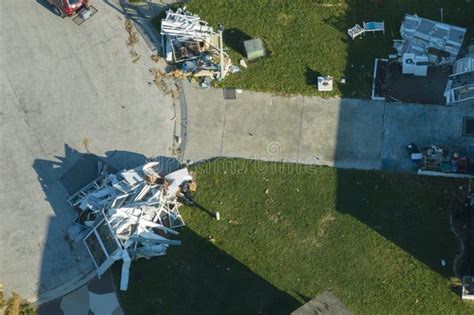 Heaps Of Debris Rubbish On Street Side Near Severely Damaged By