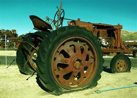 Rusty Old Tractor With A Flat Tire By Jeff Swan Old Tractor Tractors