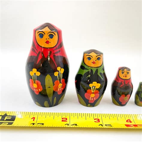 HAND-PAINTED MATRYOSHKA DOLLS SET | EstateSales.org